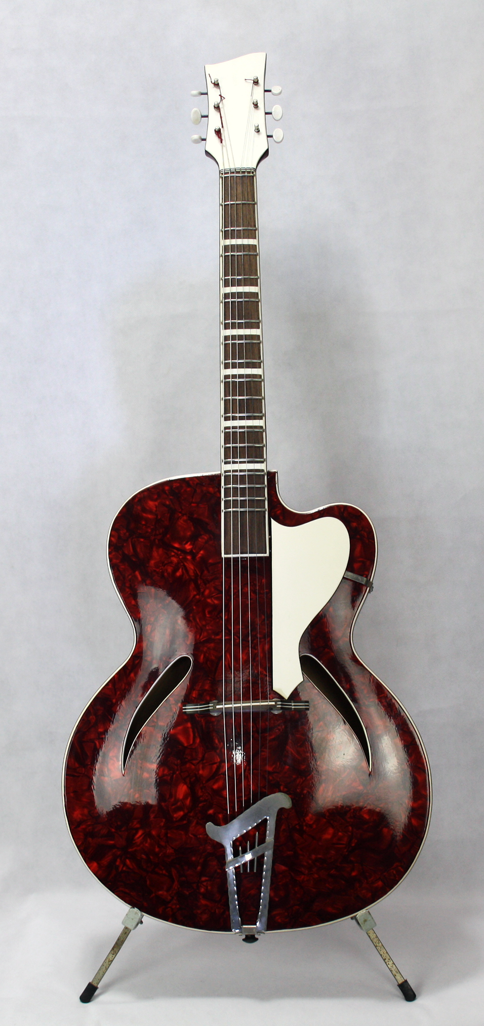 1970s Musima red perloid archtop guitar made in East Germany Guitarage.nl Guitar Crazy Crazy Guitars